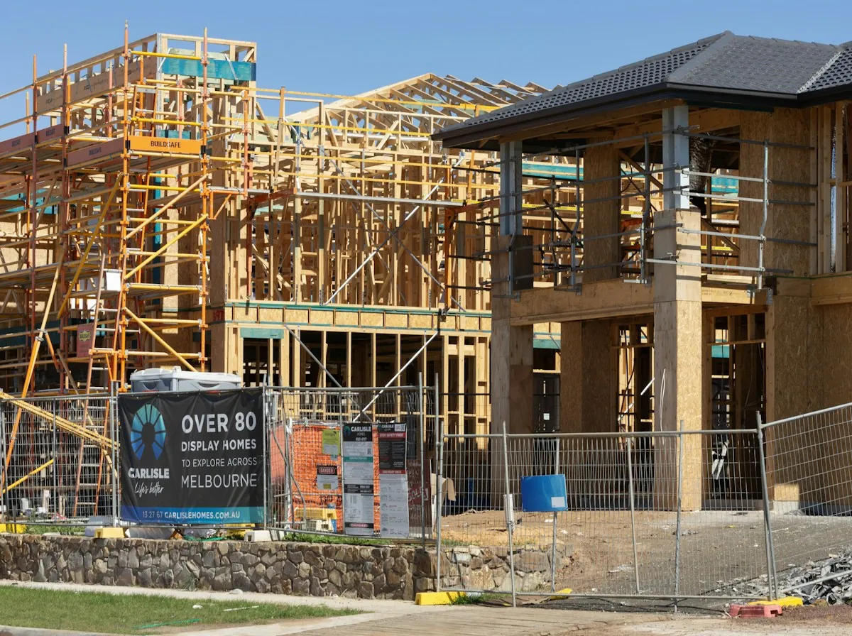 Roof Replacement in Rialto — new homes under construction with roof framing in place